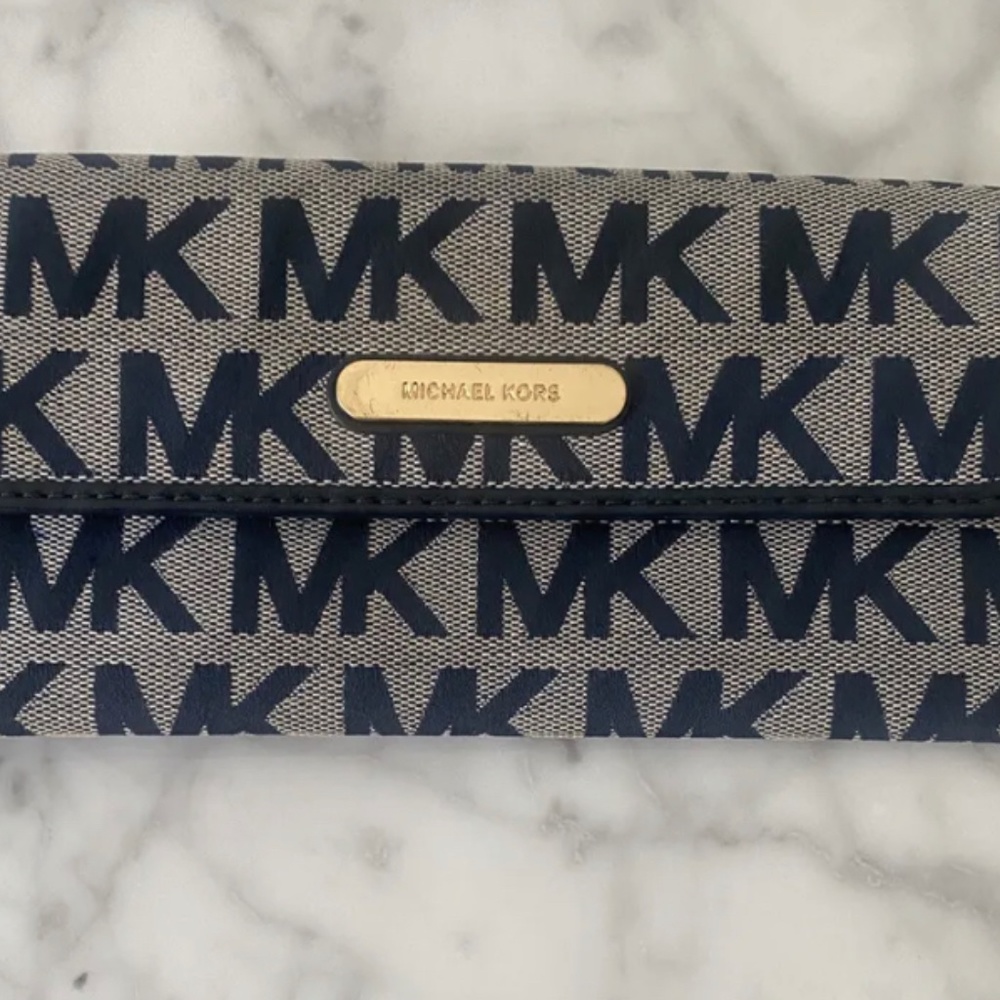 Michael Kors blue wallet MK logo button closure